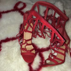 Red laced up thigh heels
